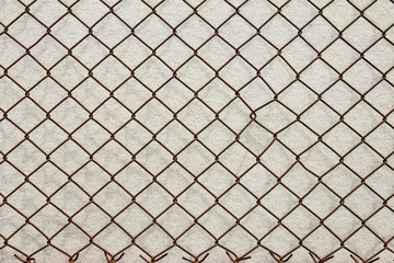 Steel mesh attached to the wall.