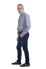 Naklejka premium middle-aged man with blue jeans and shirt on white background