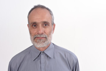 portrait of a middle-aged man with shirt and white background