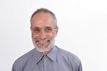 portrait of a middle-aged man with shirt and white background