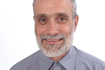 portrait of a middle-aged man with shirt and white background