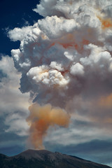 29 June 2018, Bali, Indonesia.Mount Agung volcano dramatic eruption over dark blue sky . Massive...