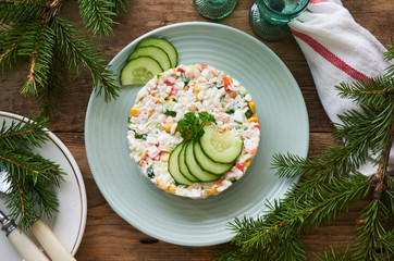 Salad with crab sticks, vegetables, rice and eggs
