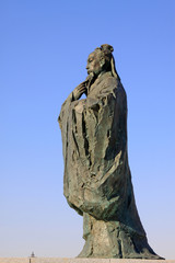 Figure sculpture in the blue sky in a park