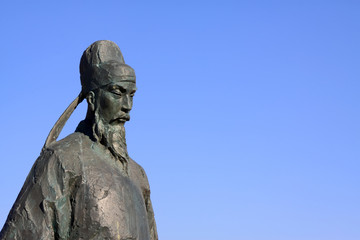 Figure sculpture in the blue sky in a park