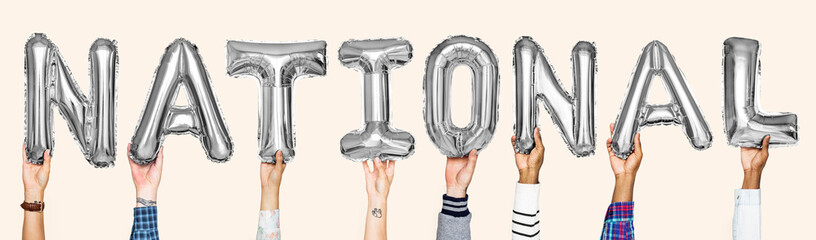Silver gray alphabet balloons forming the word national