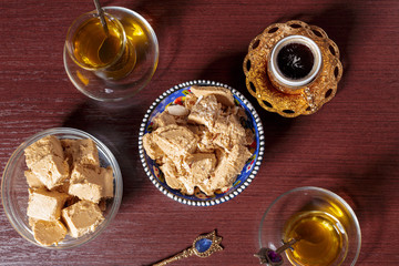 Tasty halva with tea on the table