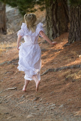 girl in white dress running away