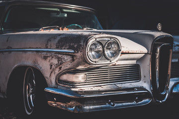 Old and worn classic American car from the fifties