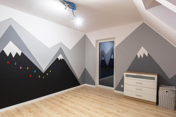 Kids bedroom with mountains chalkboard paint and new laminated floor