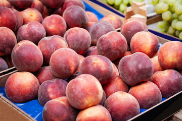 Ripe peaches in the fruit market, Catania, Sicily, Italy