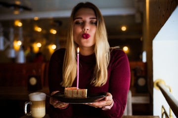 Lady plus size smile with cheesecake ,Cake lover,Women enjoy with her cake, eating  sweets , birthday day 