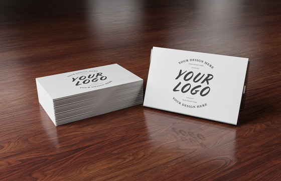 White Business Card Stack On Wooden Desk 3D Rendering