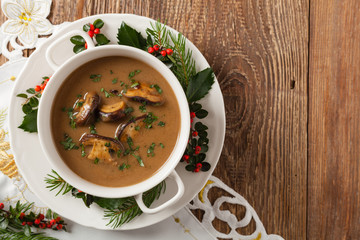 Traditional mushroom soup, made from porcini mushrooms. Christmas decoration.