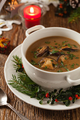 Traditional mushroom soup, made from porcini mushrooms. Christmas decoration.