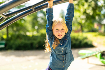 An Adorable little girl enjoying her time in park