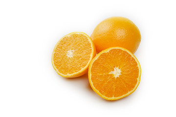 Orange cut in half on white background.