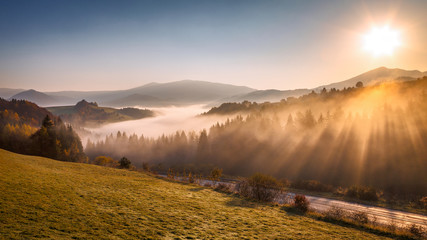 Autumn landscape, sunrise in a foggy morning in the region of Orava, Slovakia, Europe.