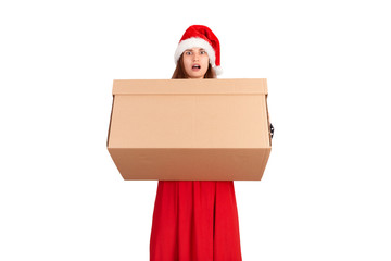 shocked excited girl standing and holding open big gift carton box. isolated on white background. holidays concept