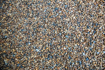 Sea pebbles. Small stones gravel texture background.Pile of pebbles, thailand.Color stone in background.