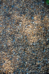 Sea pebbles. Small stones gravel texture background.Pile of pebbles, thailand.Color stone in background.