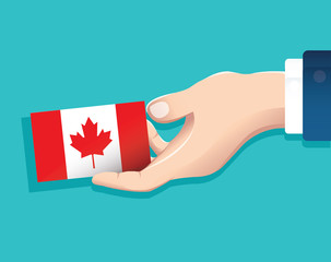 hand holding Canada flag card with blue background. vector illustration eps10