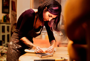 Fototapeta na wymiar woman doing carpentry work