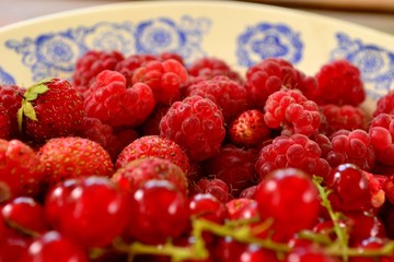 Raspberries, red currants and strawberries