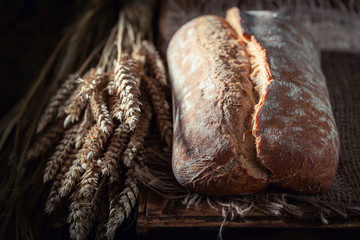 Homemade loaf of bread in rustic kitchen
