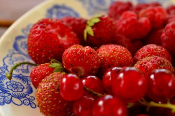 Raspberries, red currants and strawberries