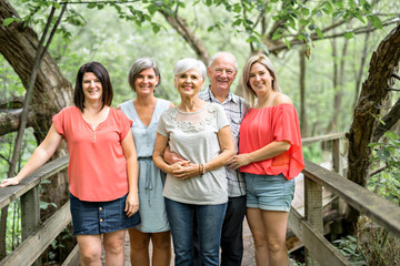 groupe of women sister together with her senior mother and father