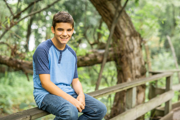 Portrait of a boy outdoors in the forest