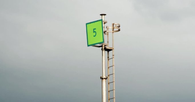 Green navigation marker at harbor entrance