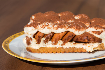 Traditional italian dessert tiramisu on a table