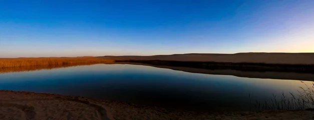 Zelfklevend Fotobehang Panorama landscape at Great sand sea and lake around Siwa oasis © homocosmicos