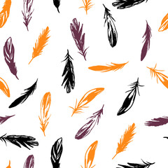 Fototapeta na wymiar Halloween seamless pattern with feathers on a white background.