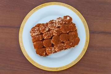 Traditional italian dessert tiramisu on a table