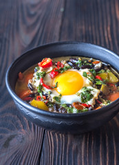 Soup of black beans and an egg