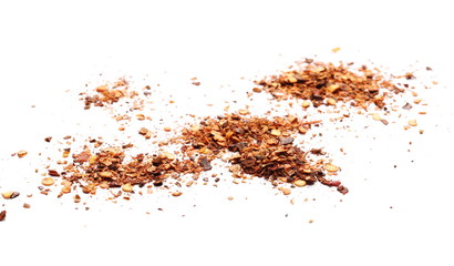 Crushed, ground red cayenne pepper, dried chili flakes and seeds isolated on white background