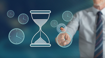 Man touching a time management concept