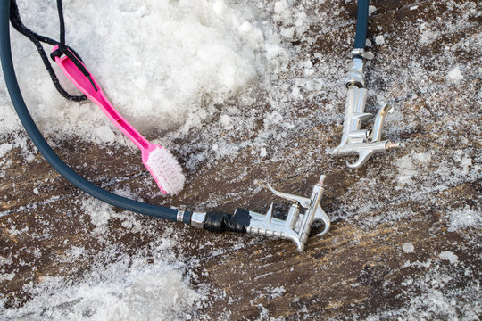 close up of ski cleaning equipment. air pumper for move out snow flake.