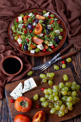 autumn salad with fruits and cheese