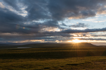 Colorful sunset over the mountains. Fantastic views of the landscape in Iceland.