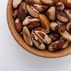 brazil nut on a white acrylic background