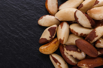brazil nut on a dark stone background