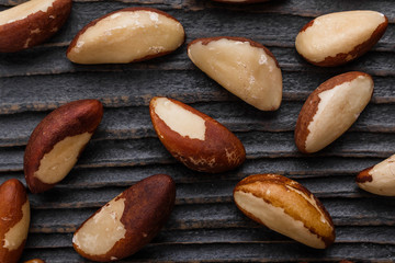 brazil nut on a dark rustic wooden background