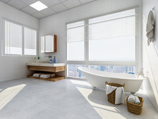 Bright bathroom with bathtub and vanity in ample space