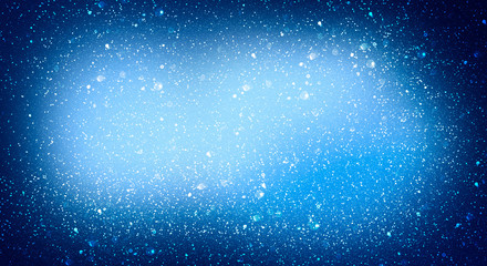 Blue bokeh background with snowflakes. Empty winter background, snowy, celebratory.