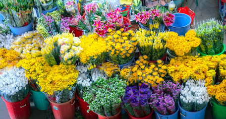 Phan Thiet, Vietnam - September 27th, 2018: Colorful fresh organic fresh flowers in market. They are used to decorate the occasion on the table, beautify the world around people in Phan Thiet, Vietnam