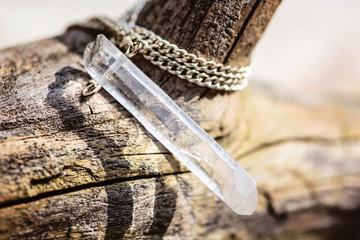 Natural crystal quartz pendant on metal chain
